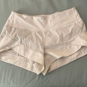 white lululemon shorts, not sure what type but they are in great condition.